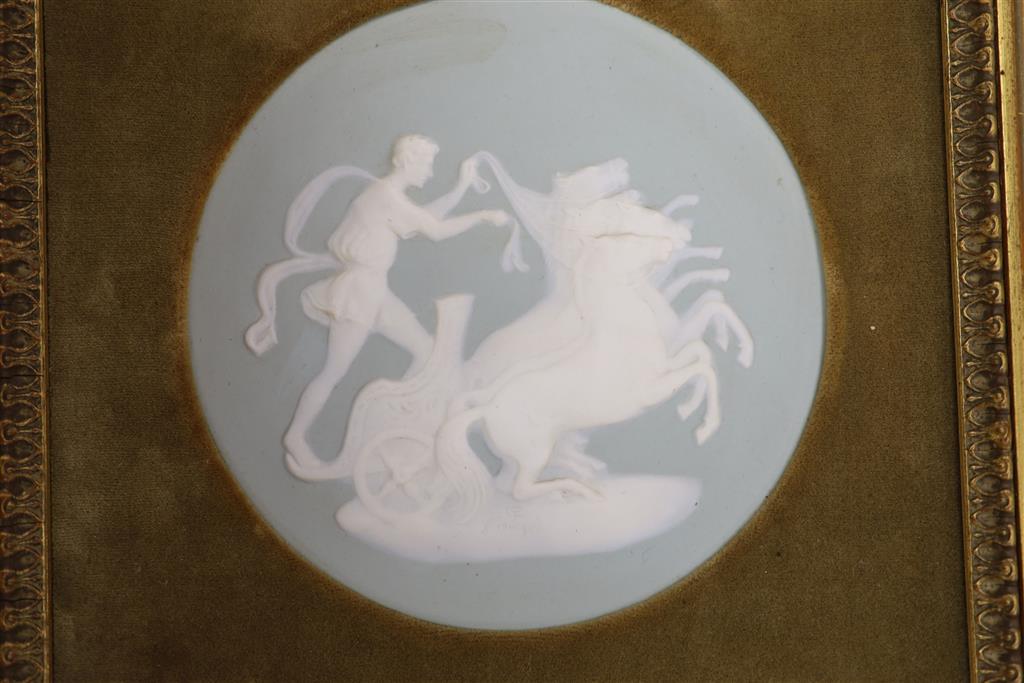 A pair of Limoges pate-sur-pate ceramic plaques, by Camille Tharaud, 5.5cm diameter (not including mount or frame)